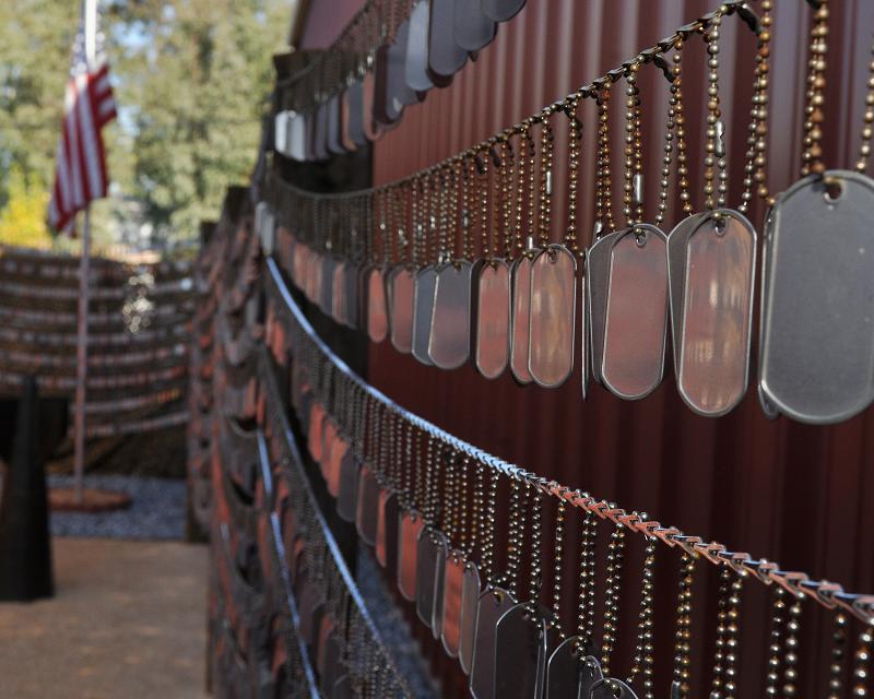 Dogs tags hang from the Iraq/Afghanistan Dog Tag Memorial at the Museum of the Forgotten Warrior outside of Beale Air Force Base, Calif., Nov. 10, 2011.  The memorial was built to honor all of the men and women who have been lost during the Iraq and Afghanistan wars and contains over 6200 individual dog tags.  (U.S. Air Force photo by Staff Sgt. Jonathan Fowler)