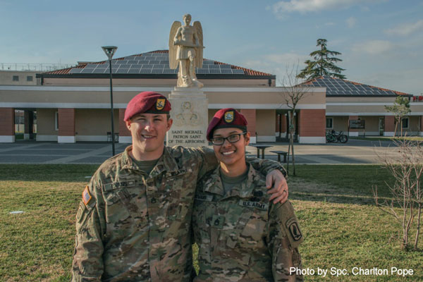 Army Staff Sgts. Zachary and Michelle Evans pose together for a photo outside the 173rd Airborne Brigade Combat Team headquarters building in Vicenza, Italy, after earning their Senior Parachutist Wings together, Jan. 23, 2018. This was the last jump they completed with the unit; it was also the last jump they both needed to obtain the title of Senior Jumpmaster.