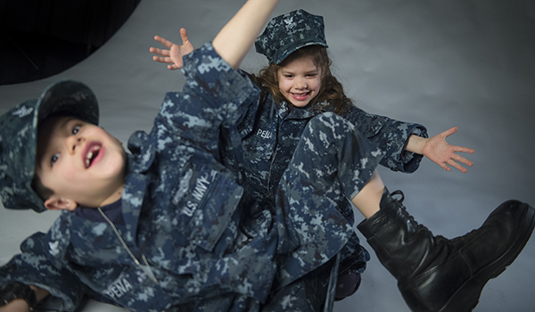 Micajah and Estelle Pena make silly faces for a portrait. U.S. Air Force photo by Staff Sgt. Vernon Young Jr.