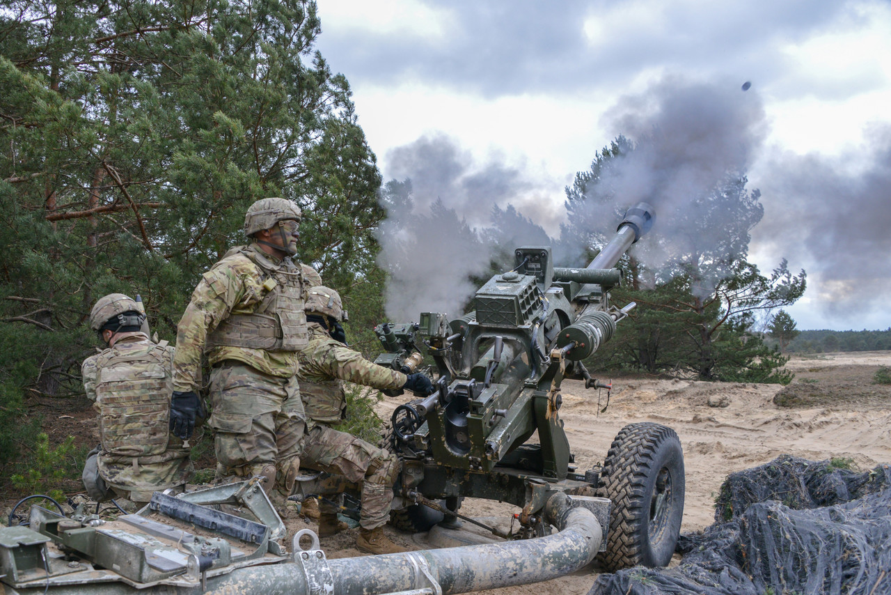 Soldiers assigned to Alpha Battery, 4th Battalion, 319th Airborne Field Artillery Regiment, fire a M119 105 mm howitzer during exercise Dynamic Front 19 at Torun, Poland, March 5, 2019. Photo By: Army Spc. Rolyn Kropf